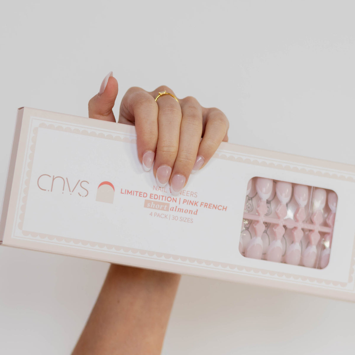 CNVS Nails Short almond French Nail Pink Nails with a white french tip in a short natural length