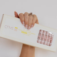 cnvs nails limited edition medium square shape, light pink base with white tip french nails