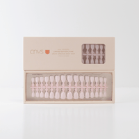 Two Limited Edition Short Almond Pink Nail Sizer Tools with usable nail extensions by CNVS Nails