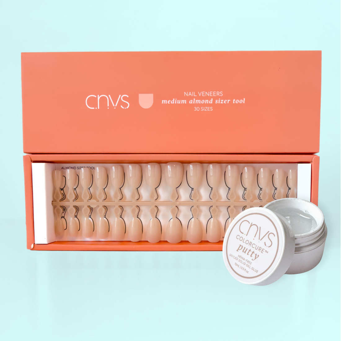 Mini Mani Nail Kit: Medium Mood. Includes medium nude almond nails, a sizer tool, and application putty by CNVS Nails