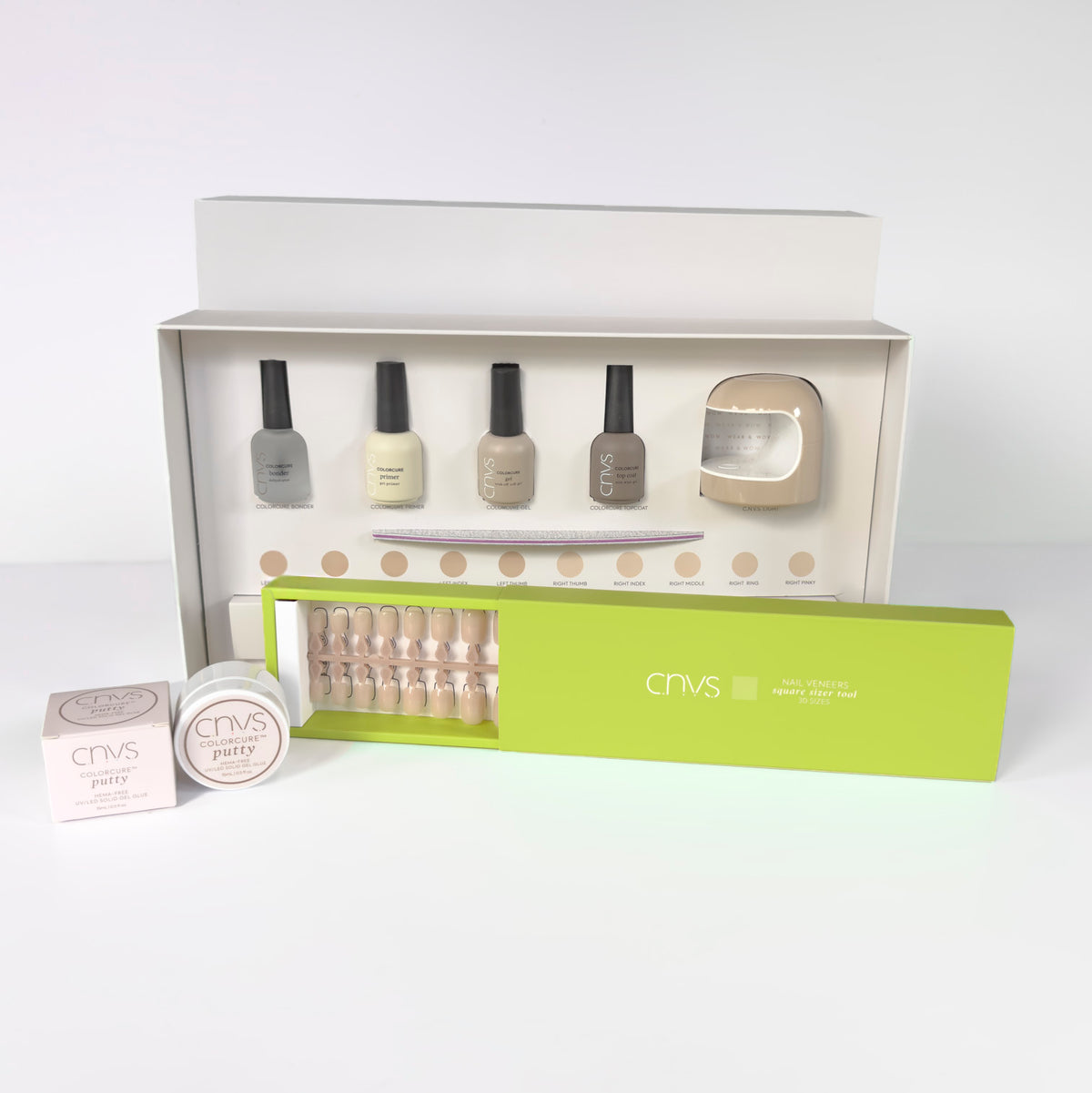 Quick Start Bundle with short nude square nails and application supplies for DIY manicures by CNVS Nails