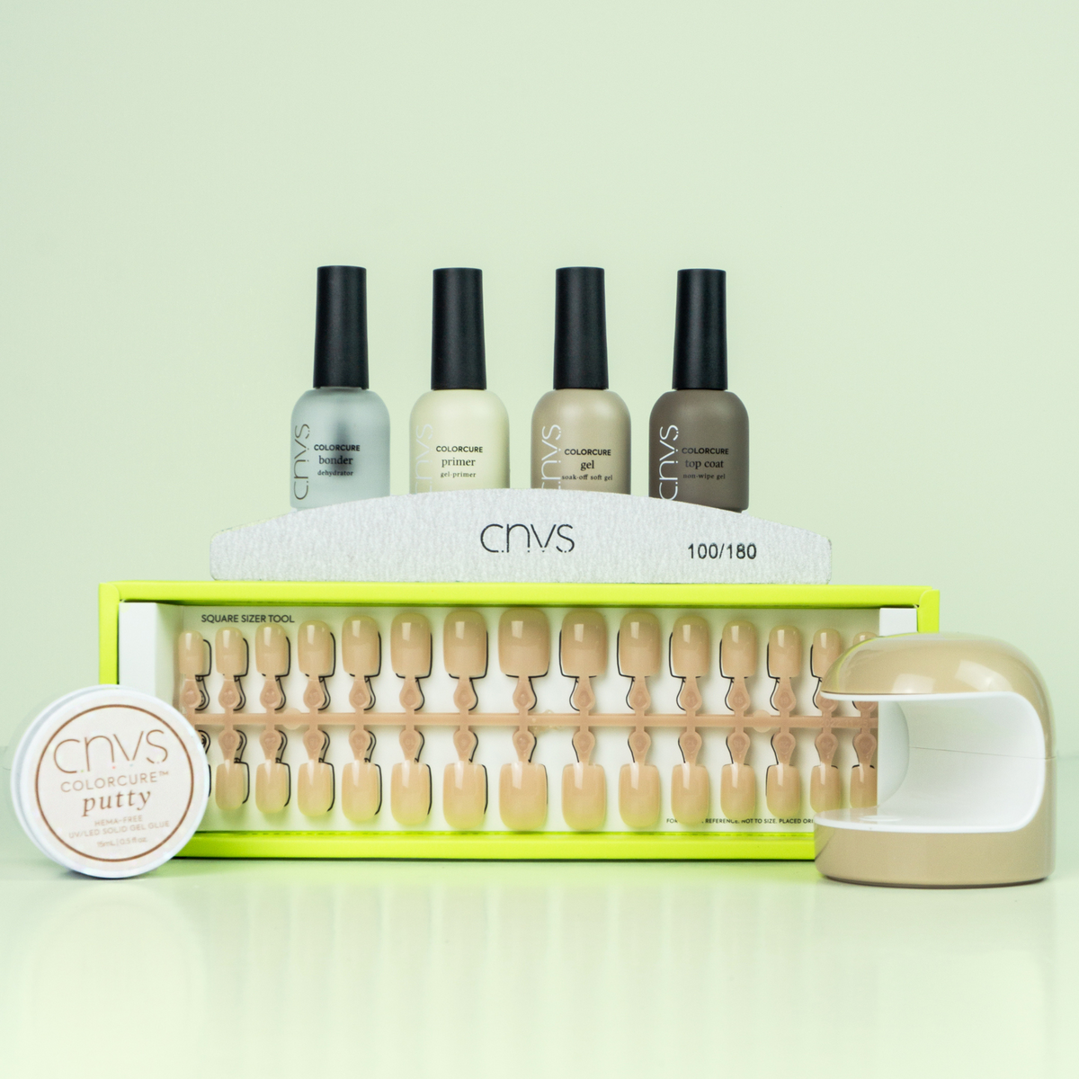 Quick Start Bundle with medium nude square nails and application supplies for at-home manicures by CNVS Nails