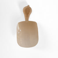 Single usable short nude square gel nail extension for at-home manicures by CNVS Nails. Used to build a custom-fit manicure set